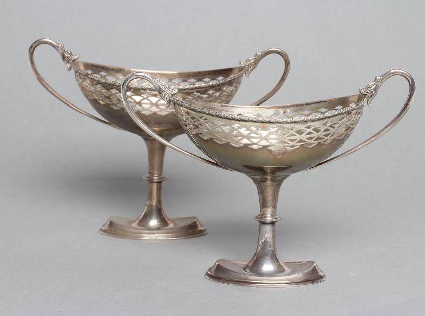A PAIR OF SILVER PEDESTAL SWEETMEAT DISHES Image