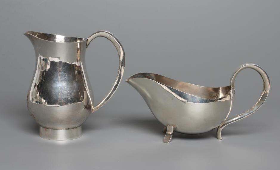 A SIILVER MILK JUG Image