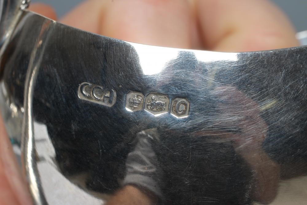 A SIILVER MILK JUG Image