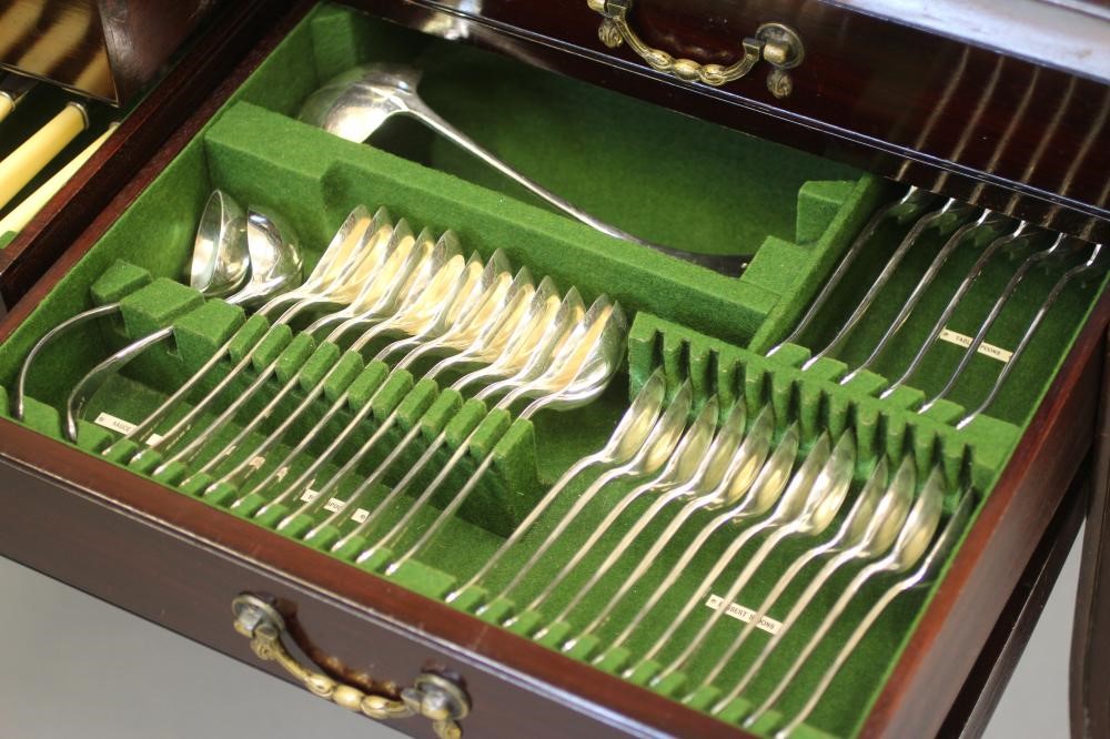 AN EPNS TABLE SERVICE FOR TWELVE PLACE SETTINGS in Rat Tail pattern Image