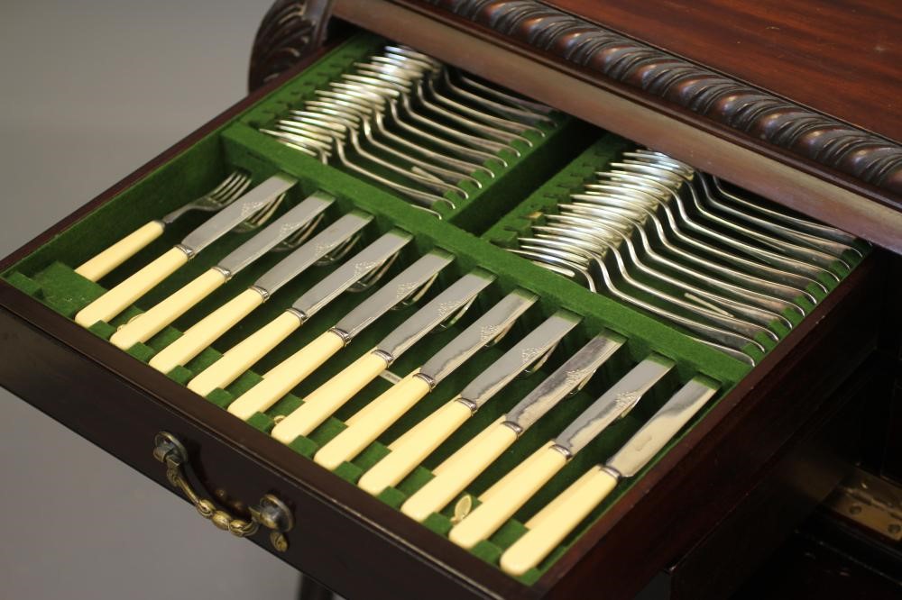 AN EPNS TABLE SERVICE FOR TWELVE PLACE SETTINGS in Rat Tail pattern Image