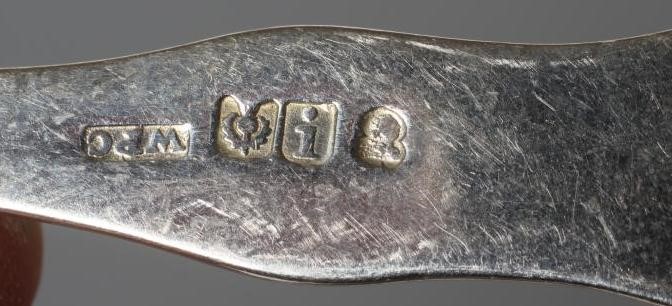 A SET OF ELEVEN SCOTTISH SILVER DESSERT FORKS Image