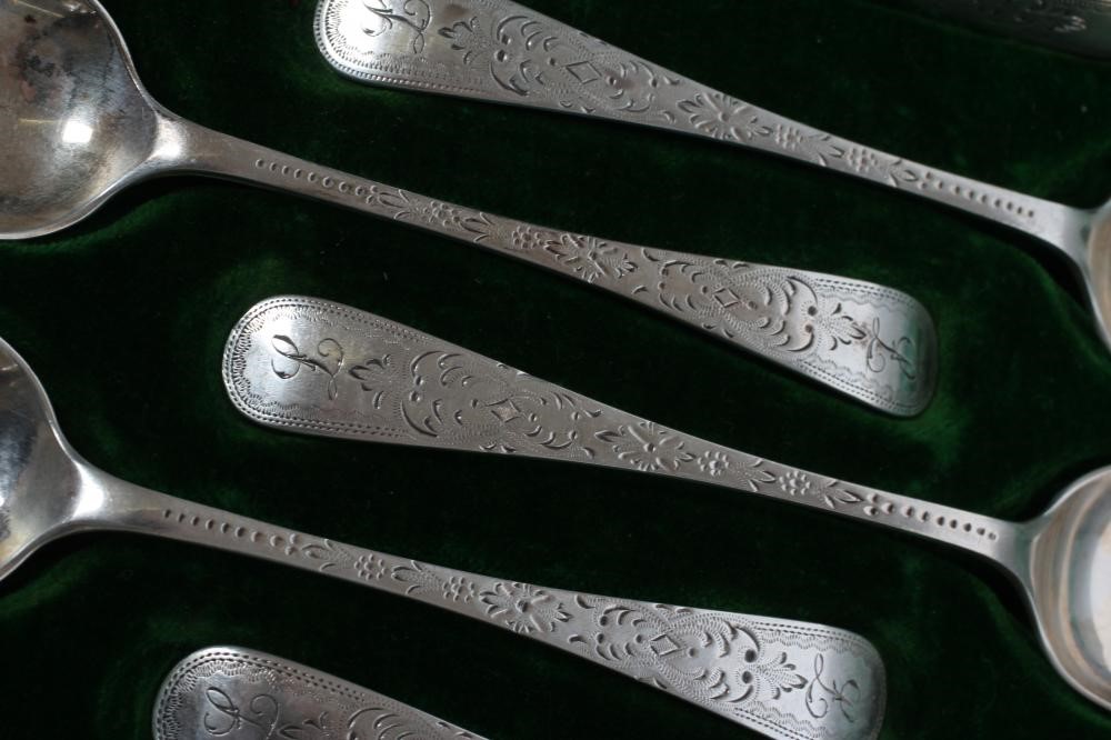 A SET OF TWELVE LATE VICTORIAN SILVER TEASPOONS Image