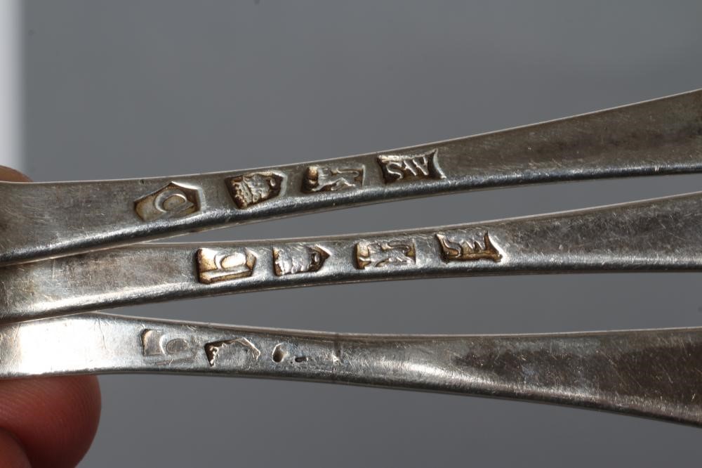 A SET OF THREE GEORGE II SILVER TABLESPOONS Image