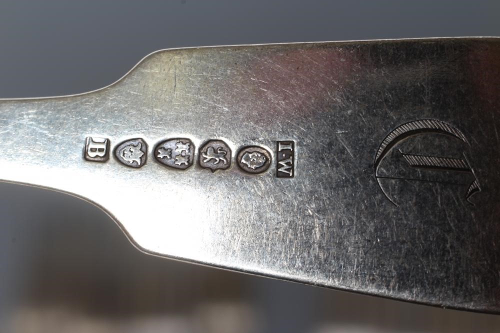 A SET OF FOUR WILLIAM IV SILVER TABLE FORKS Image