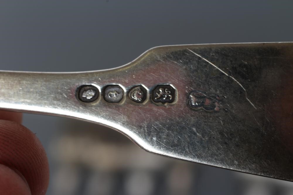 A SET OF FOUR WILLIAM IV SILVER TABLE FORKS Image