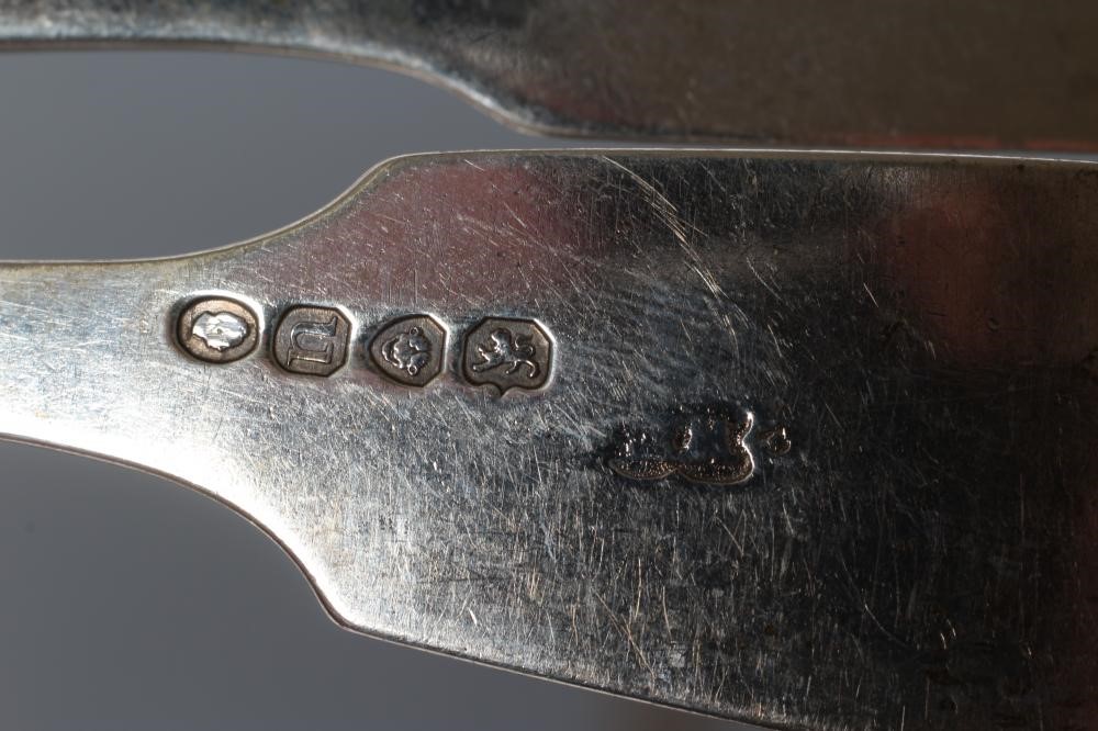 A SET OF FOUR WILLIAM IV SILVER TABLE FORKS Image