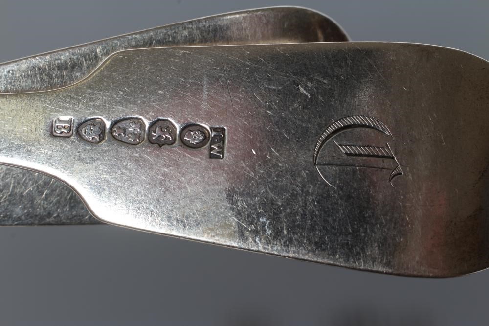 A SET OF FOUR WILLIAM IV SILVER TABLE FORKS Image