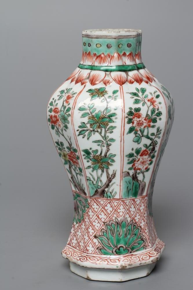 A CHINESE PORCELAIN FAMILLE VERTE VASE of octagonal inverted baluster form, painted with panels of Image