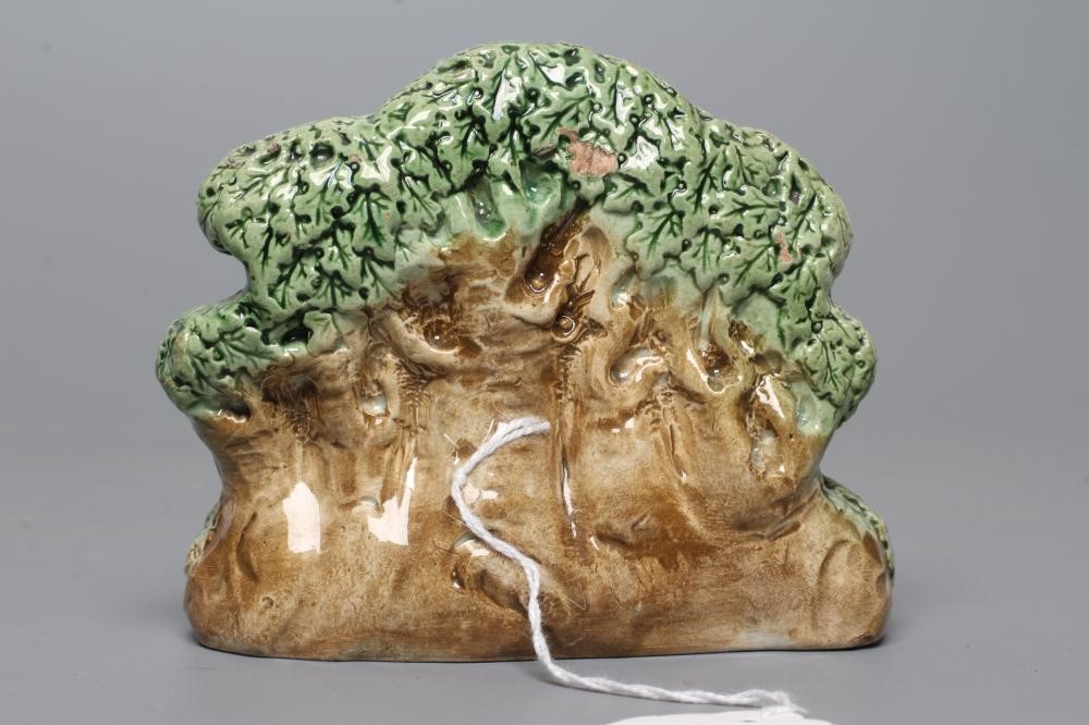 A STAFFORDSHIRE PRATTWARE SLIP CAST GROUP, early 19th century, modelled as the Babes in the Wood, Image