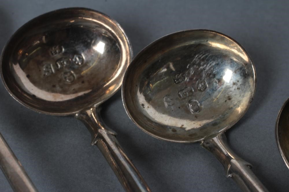 A PAIR OF GEORGE III SILVER SALT SPOONS Image