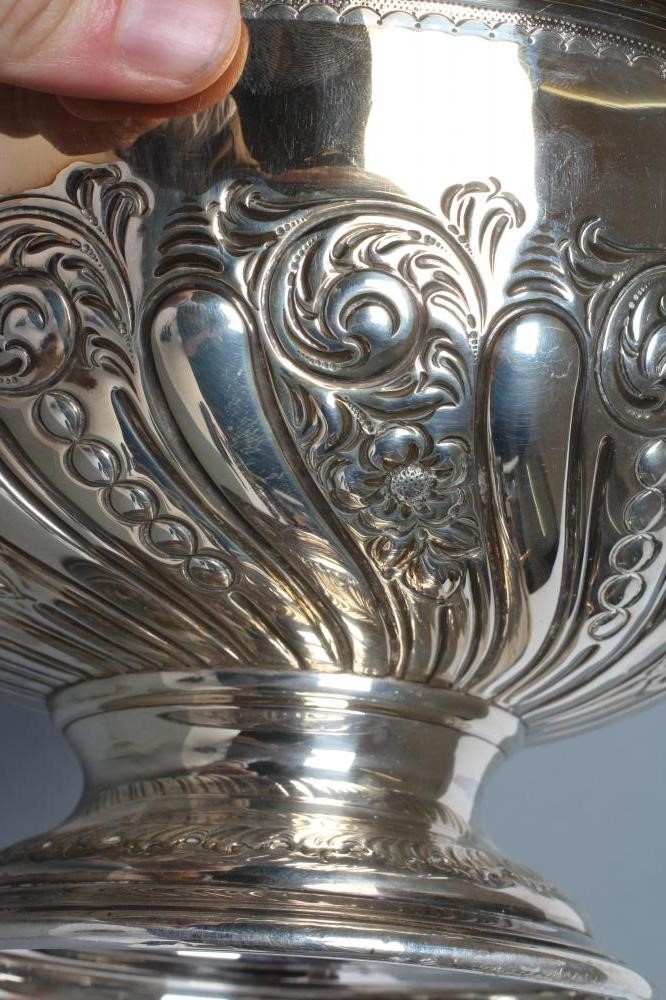 A LATE VICTORIAN SILVER ROSE BOWL, maker's mark J.D.&S., Sheffield 1900, of semi-wrythen fluted form Image