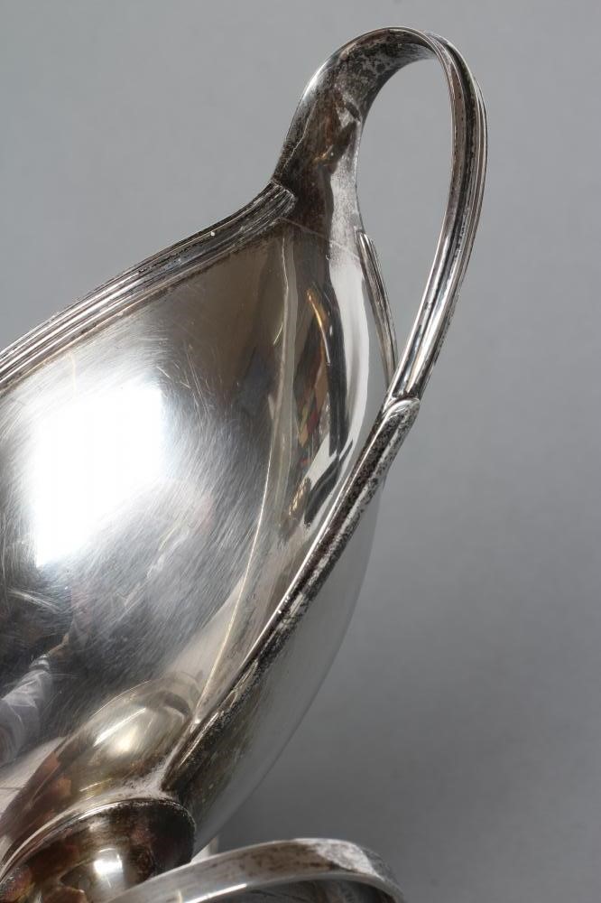 A LATE GEORGE III SILVER SAUCE TUREEN AND COVER Image