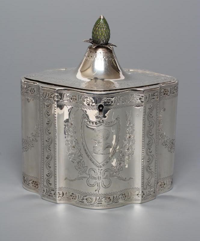 A GEORGE III SILVER TEA CADDY Image
