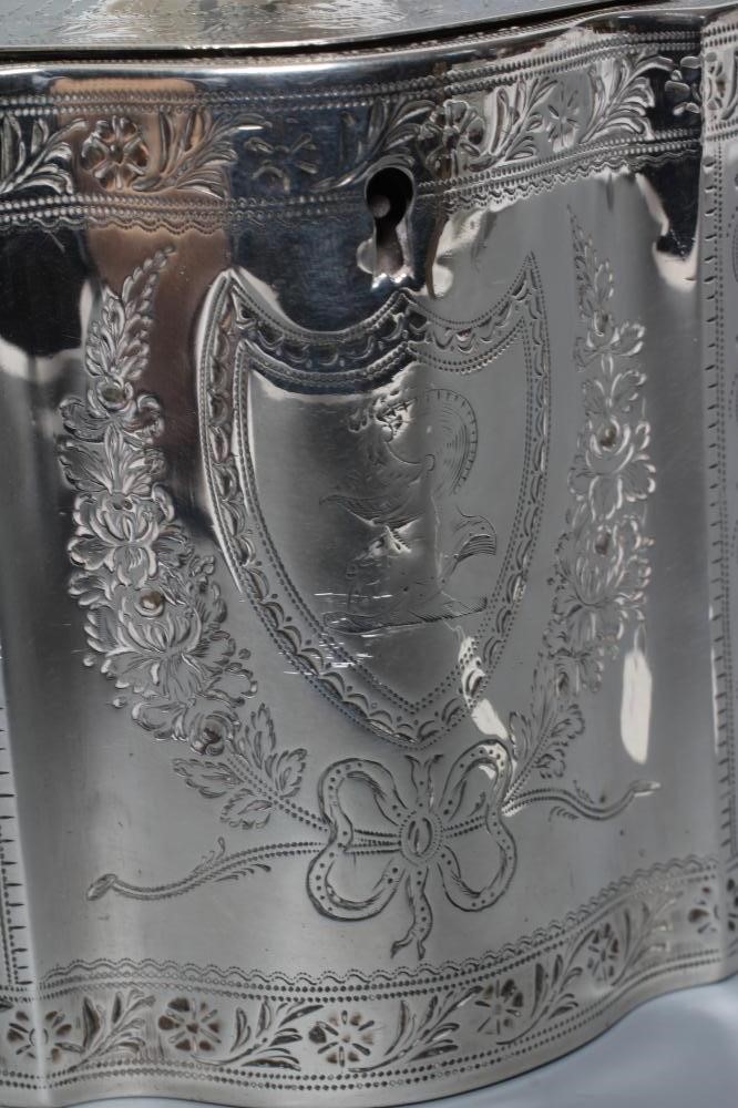 A GEORGE III SILVER TEA CADDY Image