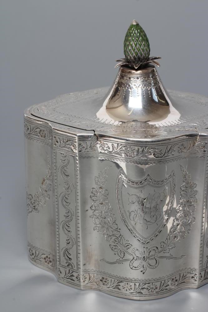 A GEORGE III SILVER TEA CADDY Image