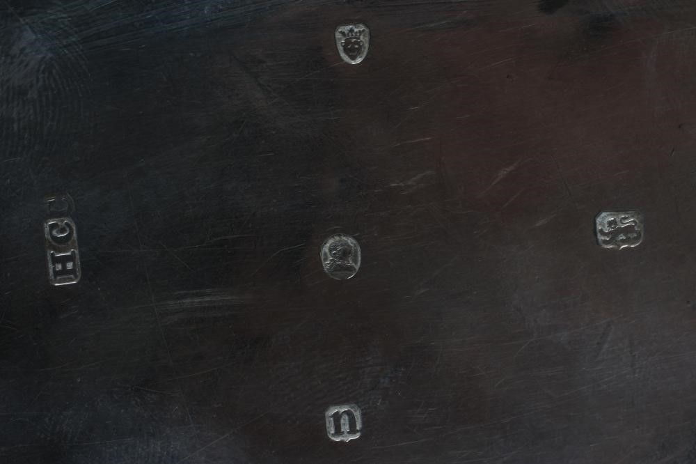 A GEORGE III SILVER TEA CADDY Image