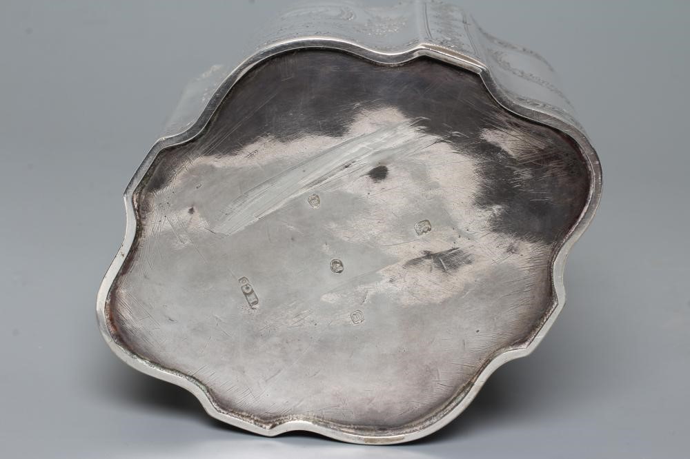 A GEORGE III SILVER TEA CADDY Image