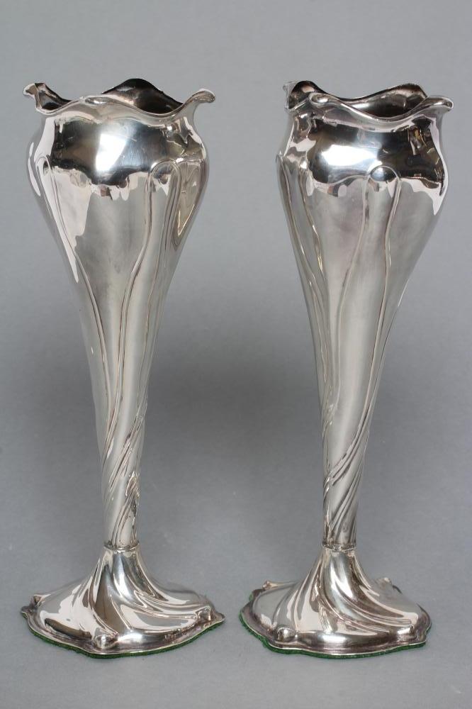 A PAIR OF EDWARDIAN ART NOUVEAU SILVER VASES Image
