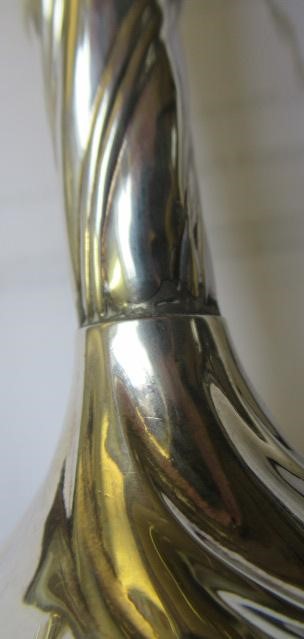 A PAIR OF EDWARDIAN ART NOUVEAU SILVER VASES Image