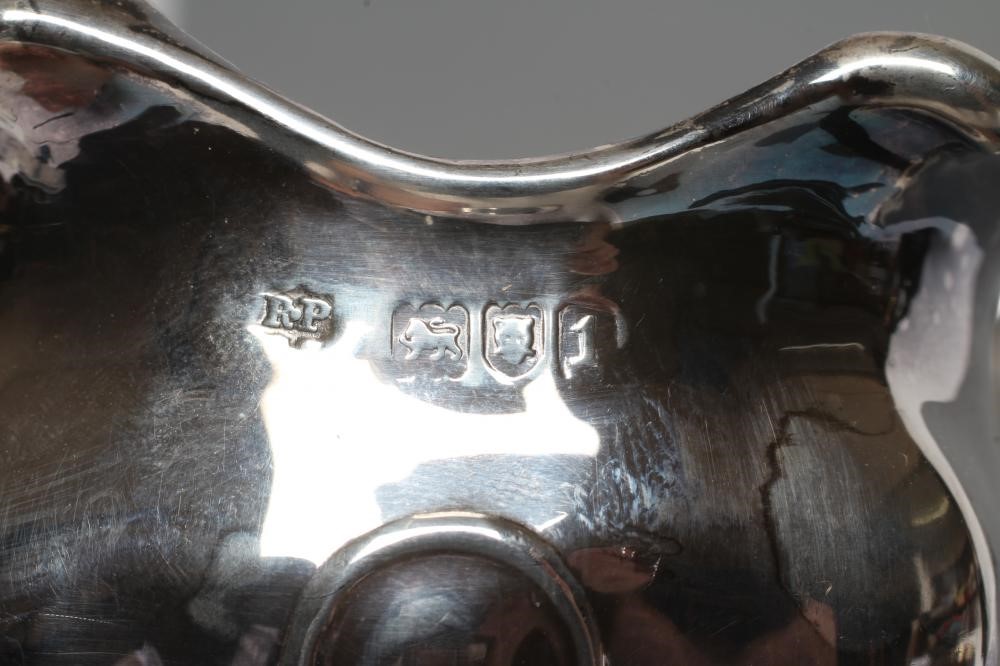 A PAIR OF EDWARDIAN ART NOUVEAU SILVER VASES Image