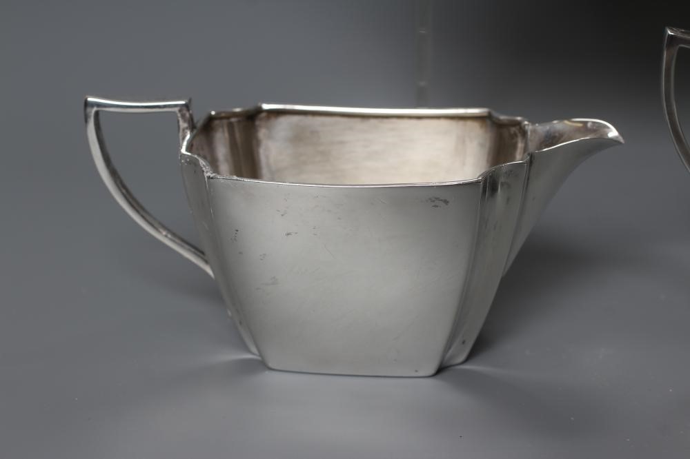 A LATE VICTORIAN SILVER THREE PIECE TEA SERVICE Image