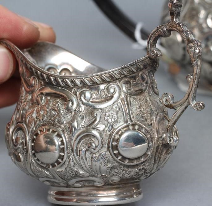 A COMPOSITE LATE VICTORIAN SILVER BACHELOR'S THREE PIECE TEA SERVICE Image