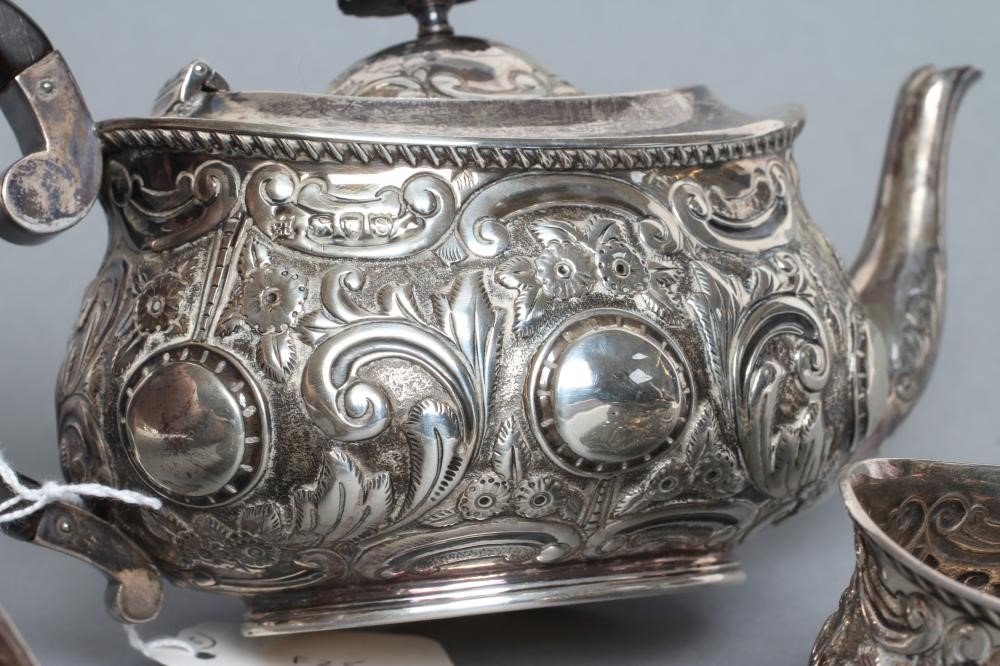 A COMPOSITE LATE VICTORIAN SILVER BACHELOR'S THREE PIECE TEA SERVICE Image