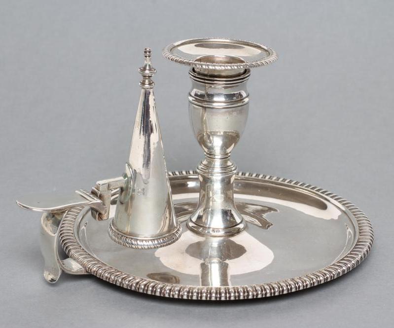 A LATE GEORGE III SILVER CHAMBERSTICK Image