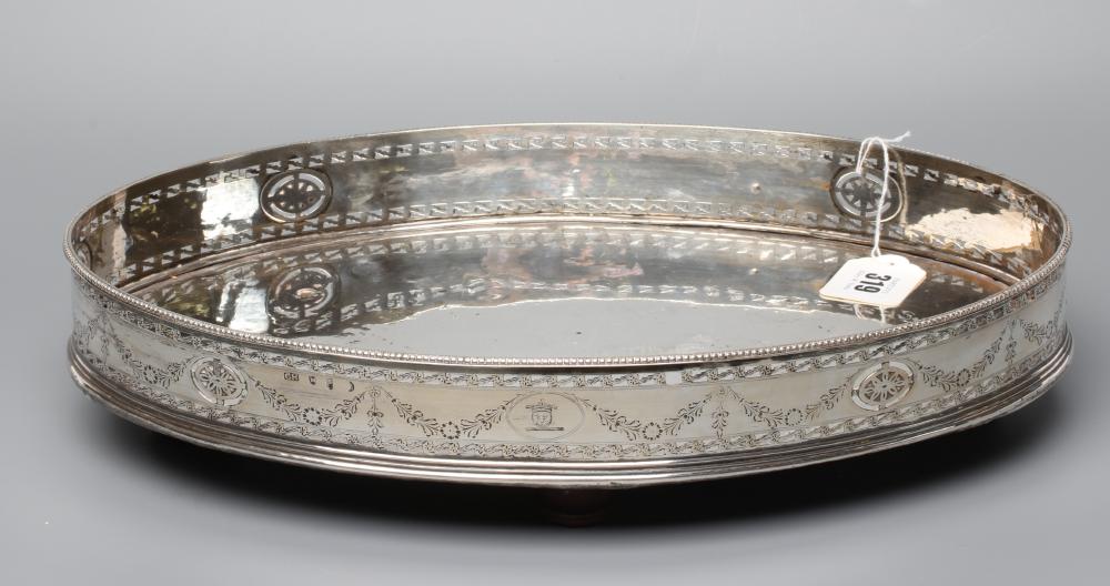 A GEORGE III IRISH SILVER GALLERIED OVAL STAND Image