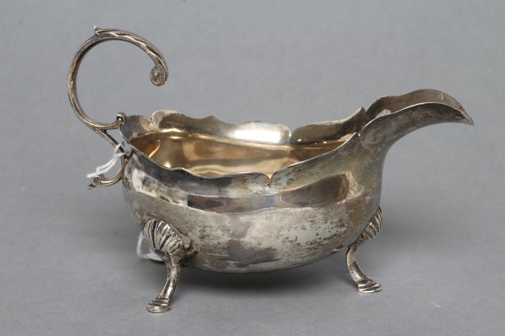 A GEORGE III SILVER SAUCE BOAT Image