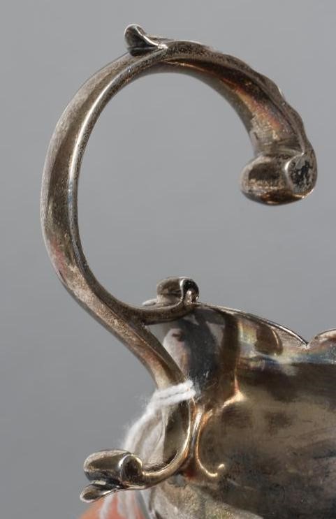 A GEORGE III SILVER SAUCE BOAT Image