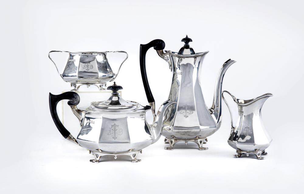 AN EDWARDIAN SILVER FOUR PIECE TEA AND COFFEE SERVICE Image