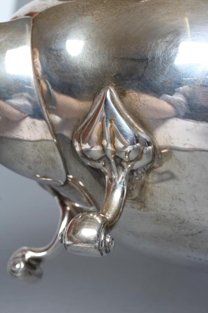 AN EDWARDIAN SILVER FOUR PIECE TEA AND COFFEE SERVICE Image