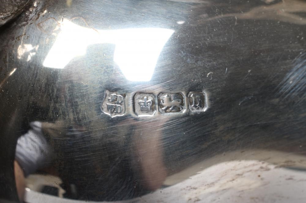 AN EDWARDIAN SILVER FOUR PIECE TEA AND COFFEE SERVICE Image