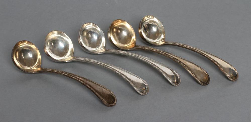 A SET OF FIVE VICTORIAN SILVER SAUCE LADLES, maker Thomas Smiley, London 1879, in bead pattern, 6" Image