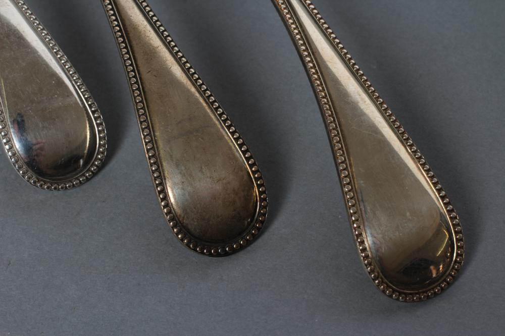 A SET OF FIVE VICTORIAN SILVER SAUCE LADLES, maker Thomas Smiley, London 1879, in bead pattern, 6" Image