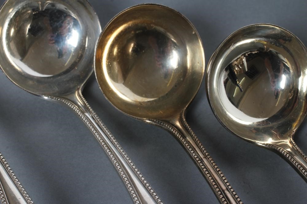A SET OF FIVE VICTORIAN SILVER SAUCE LADLES, maker Thomas Smiley, London 1879, in bead pattern, 6" Image