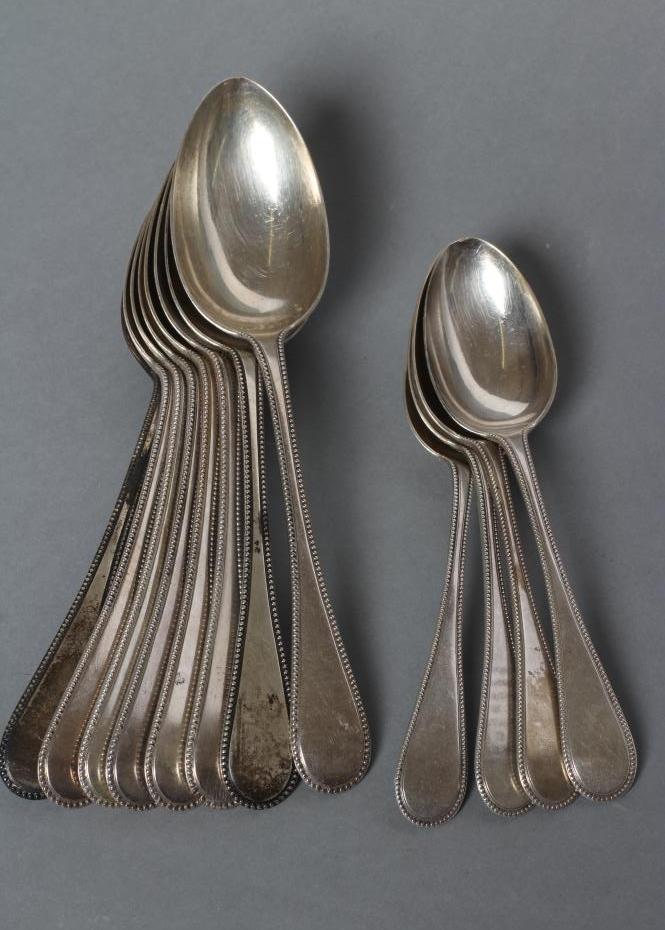 A SET OF EIGHT VICTORIAN SILVER TABLESPOONS Image