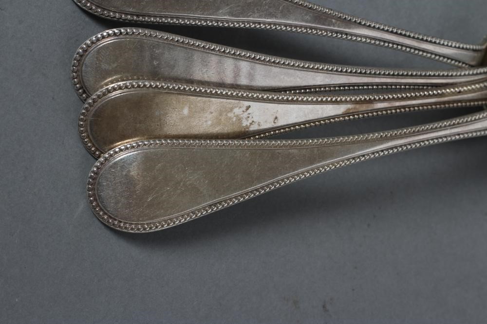 A SET OF EIGHT VICTORIAN SILVER TABLESPOONS Image