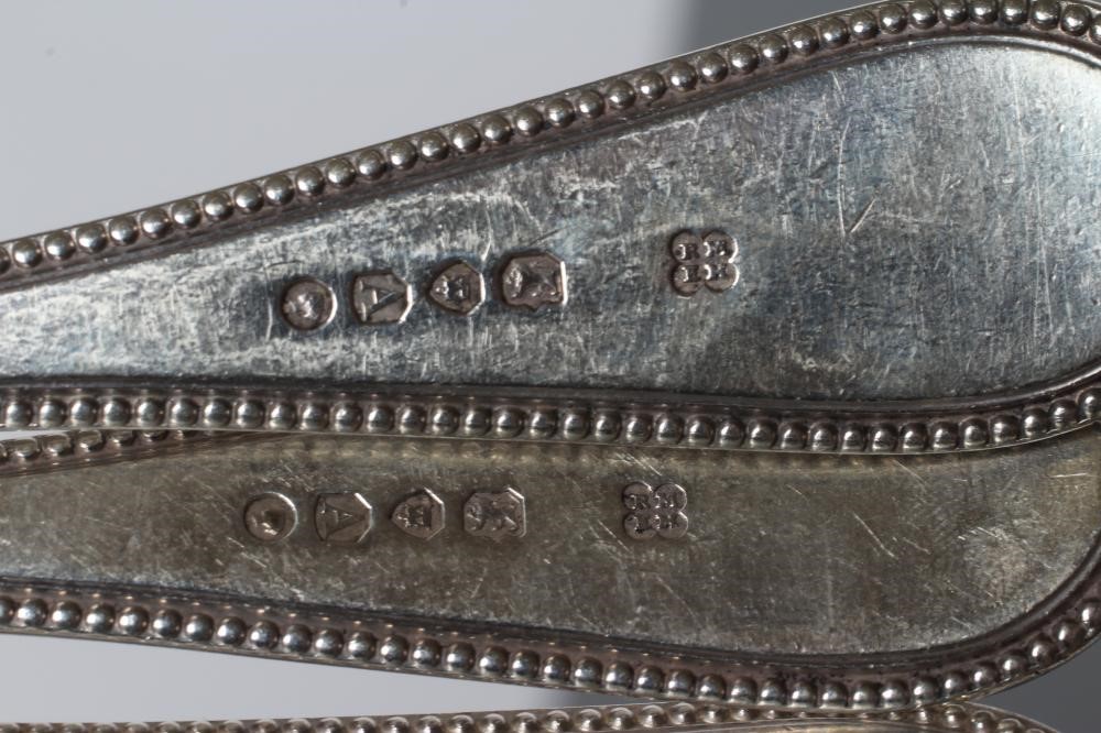 A SET OF EIGHT VICTORIAN SILVER TABLESPOONS Image