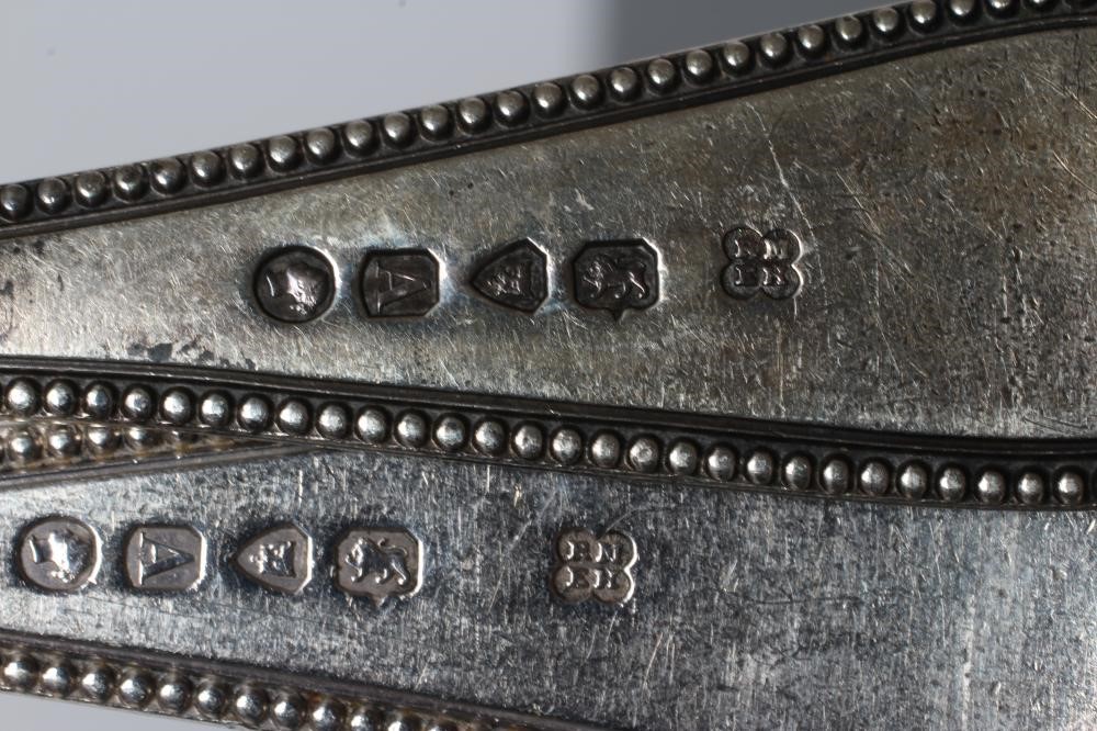 A SET OF EIGHT VICTORIAN SILVER TABLESPOONS Image