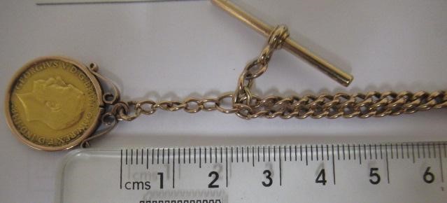 A GEORGE V HALF SOVEREIGN, 1912, in a 9ct gold loose mount and pendant from a graduated curb link Image