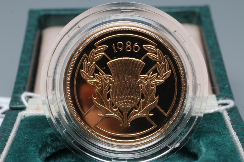 AN ELIZABETH II PROOF £2, 1986, 15.98g, in capsule and cased with certificate No.00875 (Est. plus Image