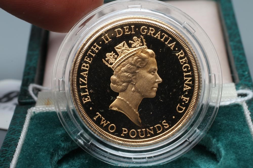 AN ELIZABETH II PROOF £2, 1986, 15.98g, in capsule and cased with certificate No.00875 (Est. plus Image