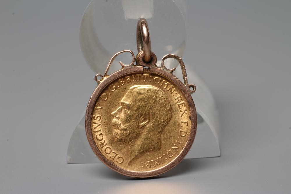 A GEORGE V HALF SOVEREIGN, 1912, loose mounted as a pendant, stamped 9ct, 5.5g total (Est. plus 20% Image