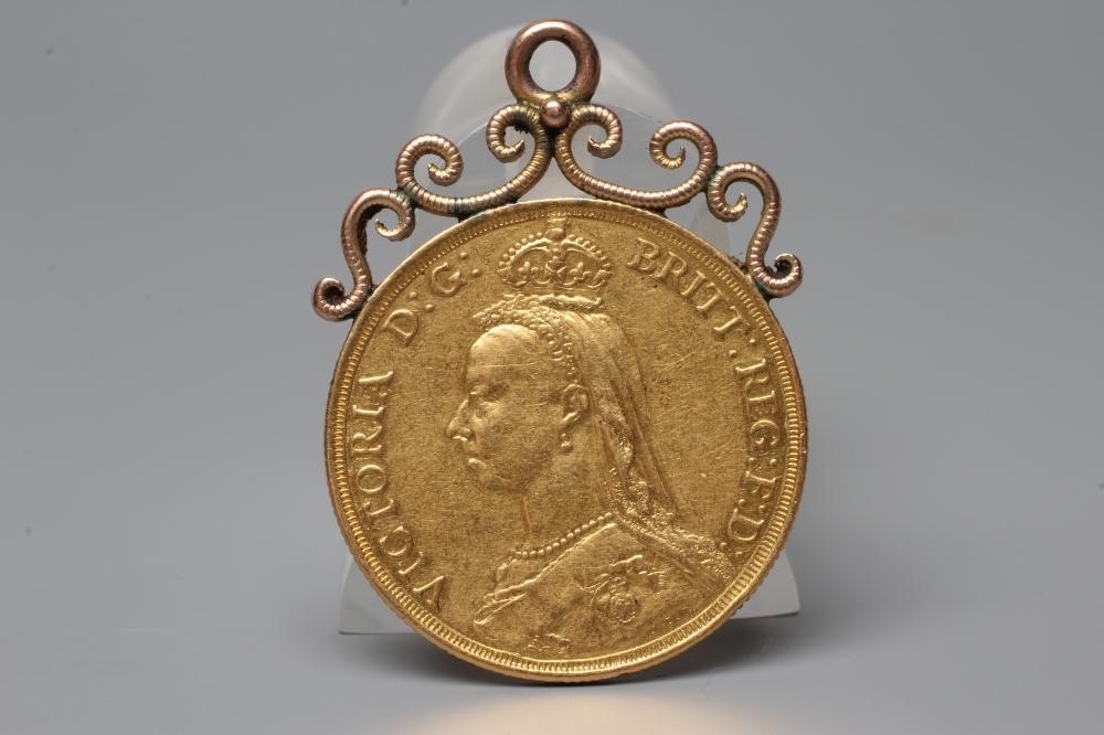 A VICTORIA JH GOLD £2, 1887, with hard soldered unmarked scroll mount, 17.8g gross (Est. plus 20% Image