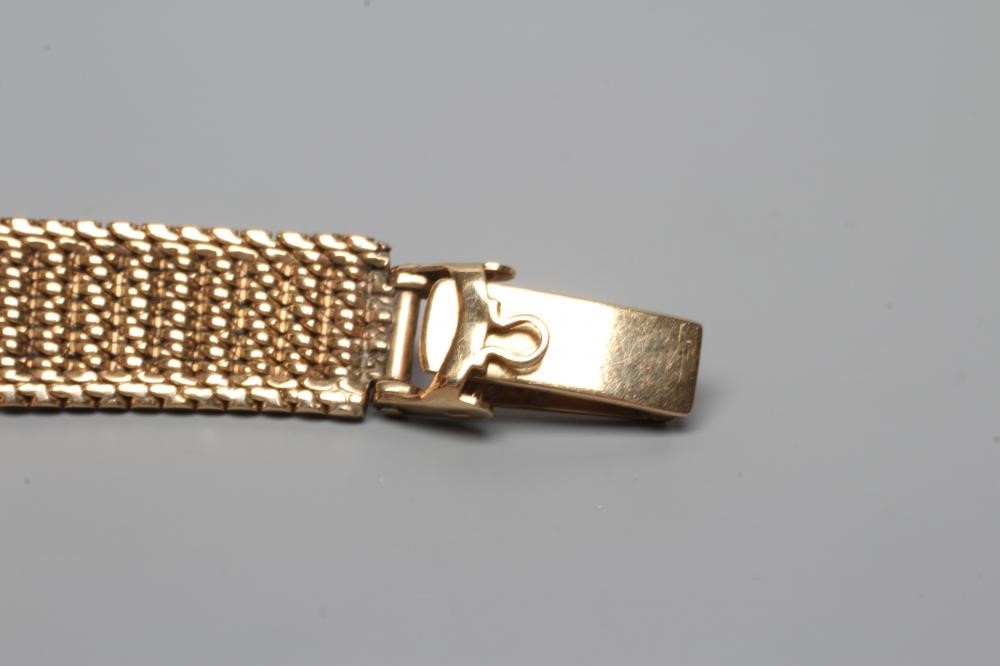 A LADY'S 9CT GOLD OMEGA WRISTWATCH Image