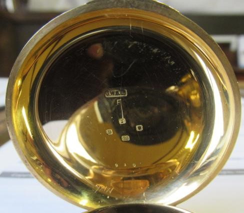 AN 18CT GOLD TOP WIND HALF HUNTER POCKET WATCH Image