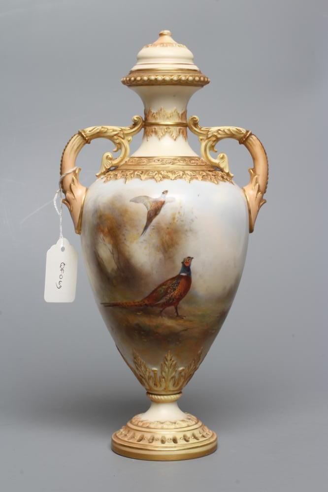 A ROYAL WORCESTER CHINA VASE AND COVER Image